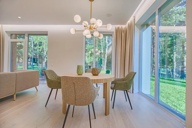 First-time buyers comparing two plot layout plans side by side